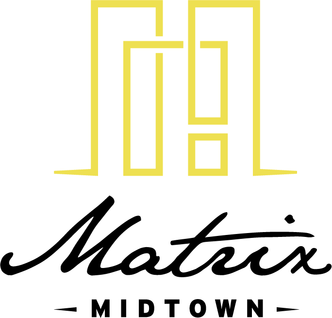 A logo with the word "Matrix" in cursive font with a yellow outline.